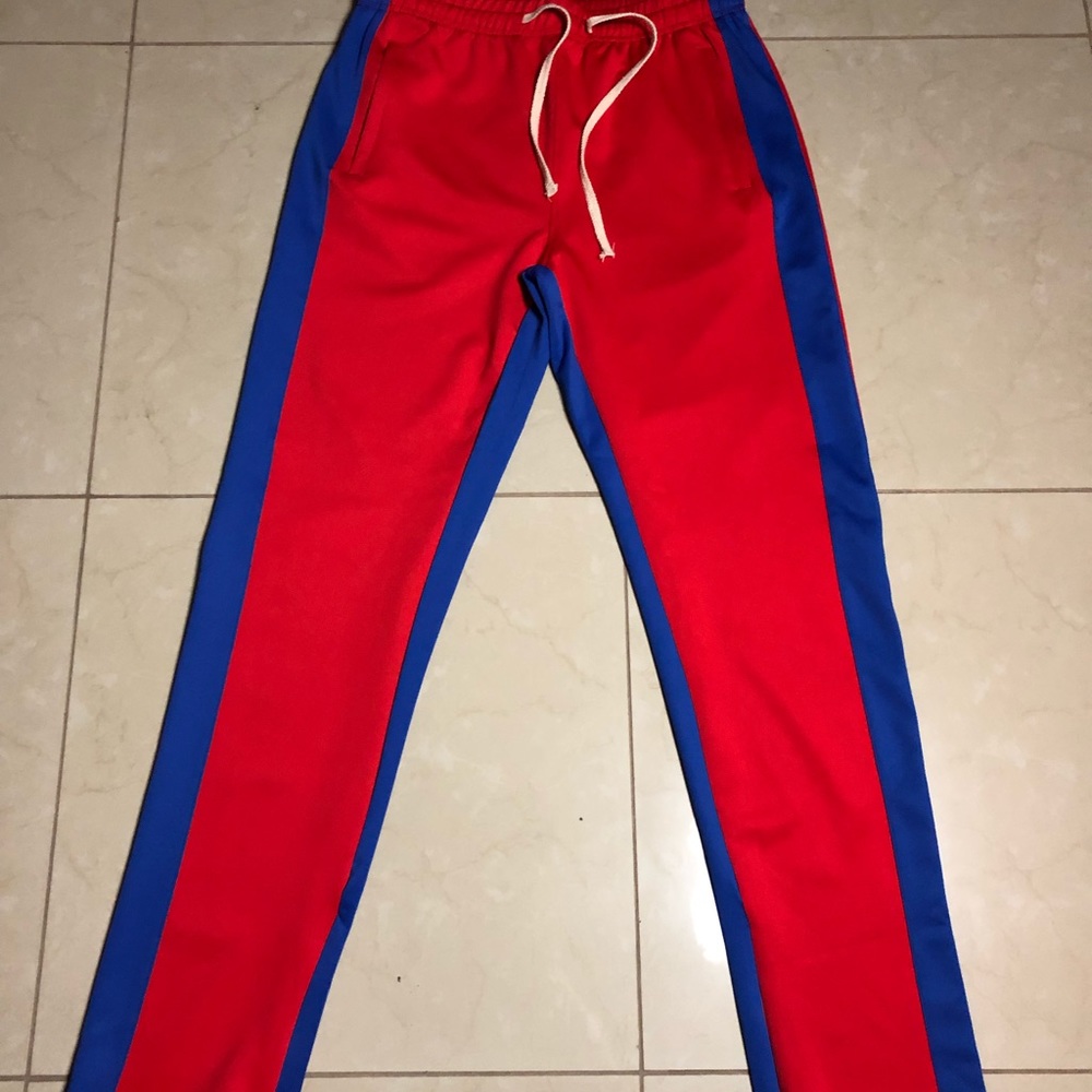 Imperious red track pants